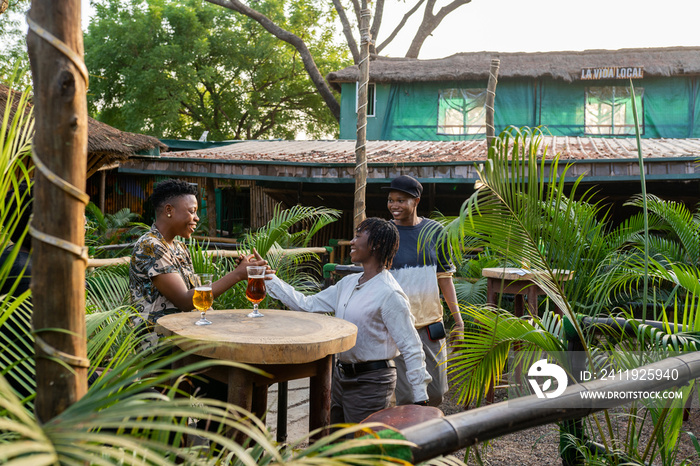 Queer masculine black women in a garden