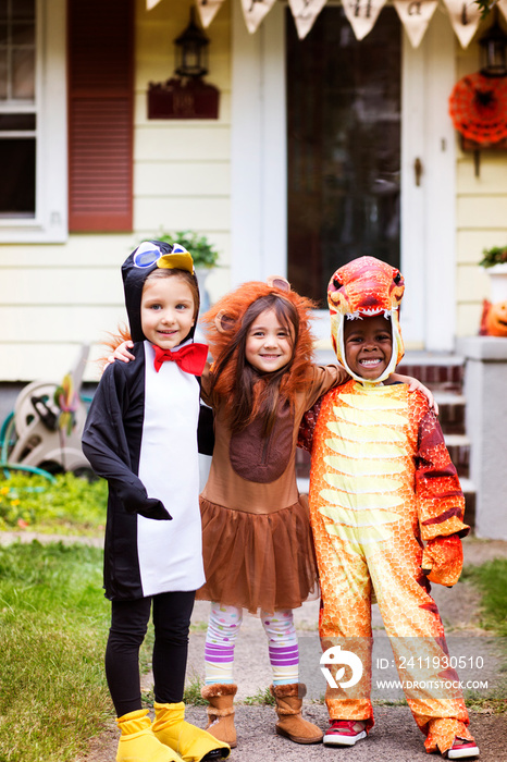 Children (4-5) wearing costumes on halloween