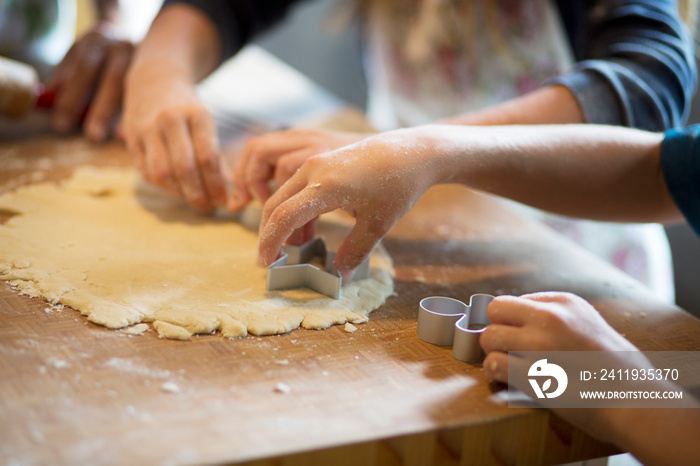 Children (6-7) making cookies