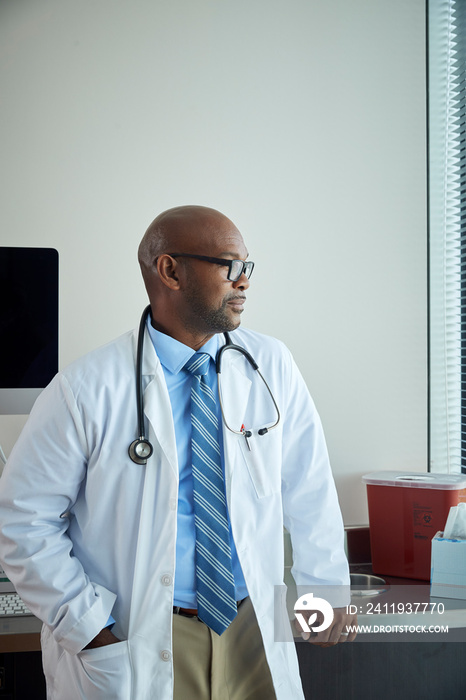 Doctor posing in medical office