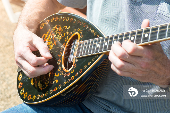 Bouzouki outdoor performance player