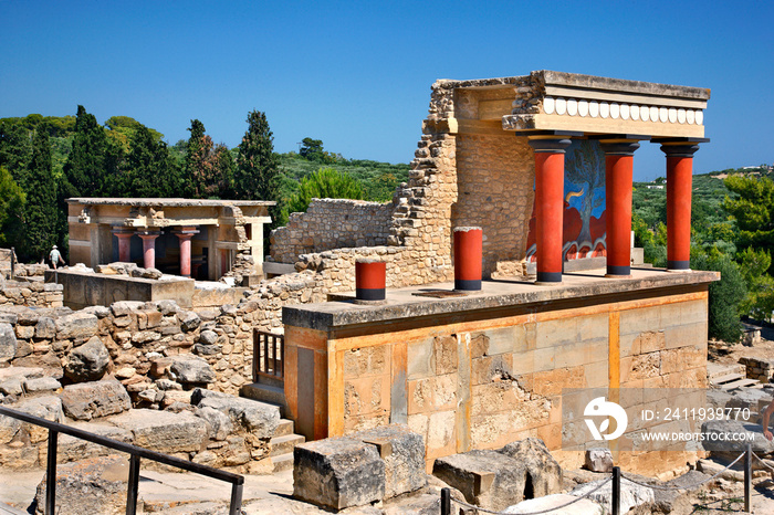 Partial view of the Minoan Palace of Knossos with characteristic columns and a fresco of a bull behi