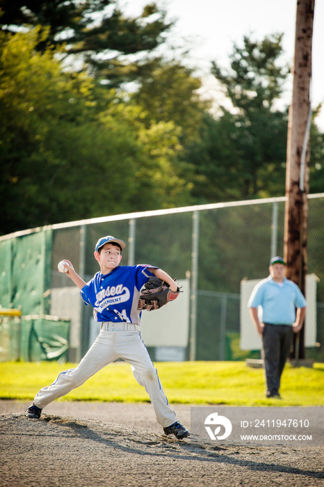 Player throwing ball in field