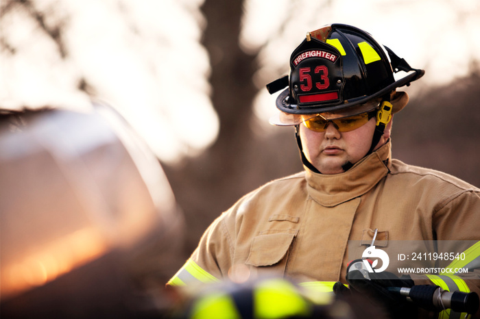 Firefighter on car crash site