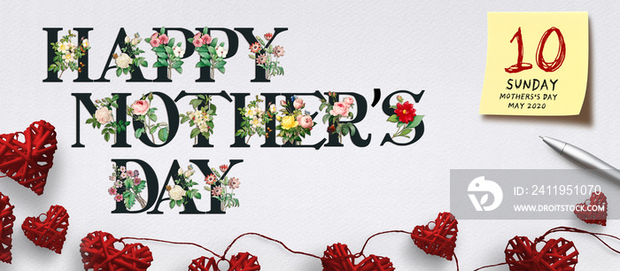 横幅，文字为母亲节快乐，纸背景为花朵和心形装饰