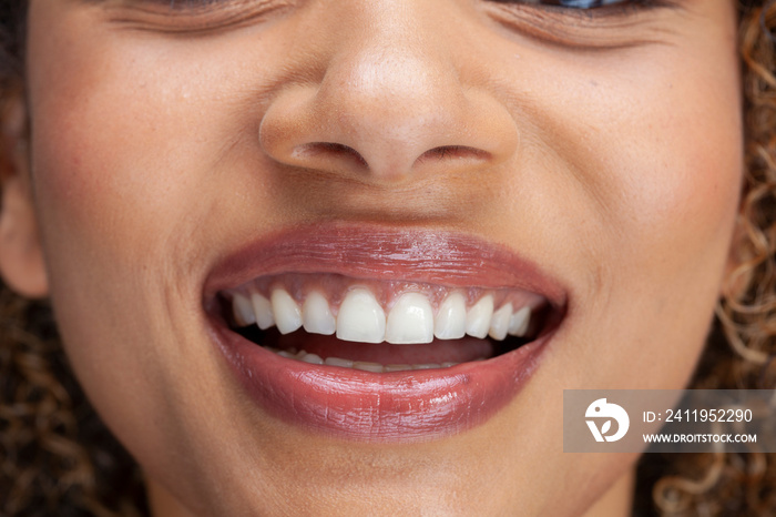 Close-up�of smiling womans lips