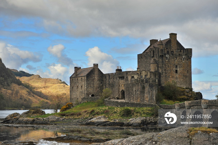 Scottish castle on a high rocky shore.