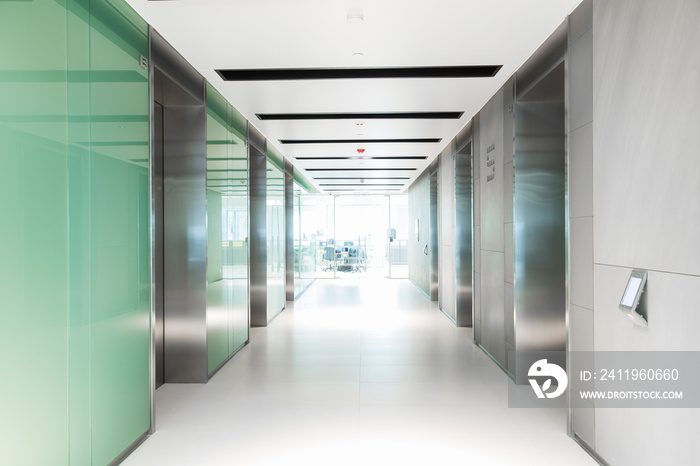 Empty hallway having elevator of business building