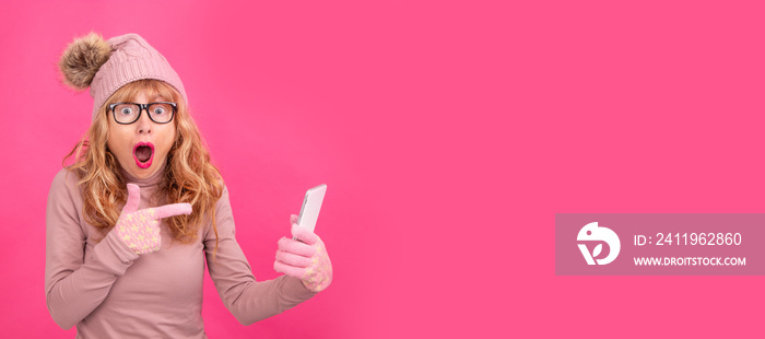 woman wearing winter clothes and isolated mobile phone with surprise expression