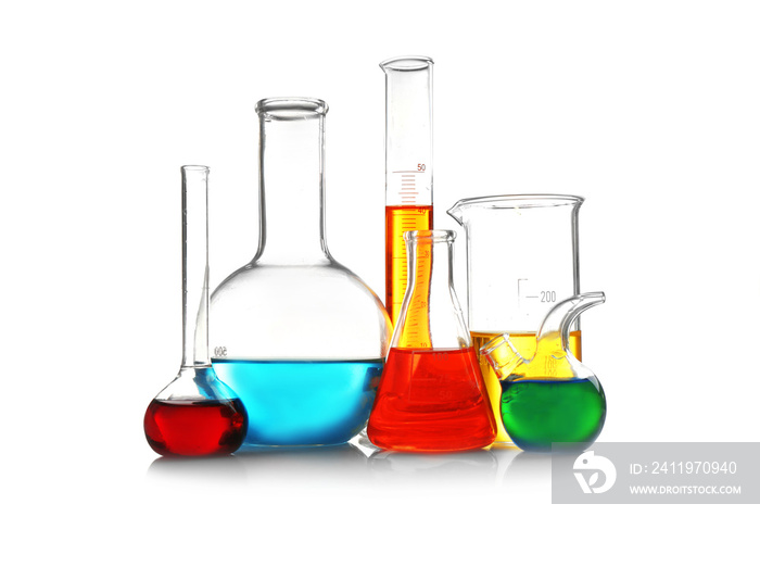 Laboratory glassware with samples on white background