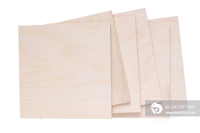 Plywood boards isolated at white background. Stack of plywood pieces on white