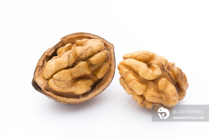 Walnut and walnut kernel isolated on the white background.