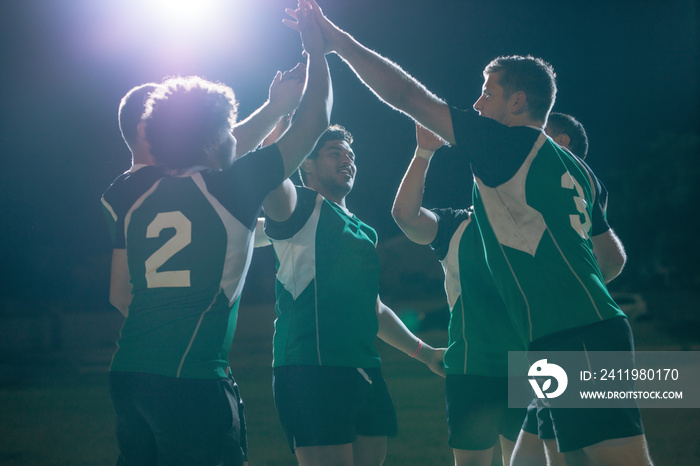 Rugby players celebrating championship win