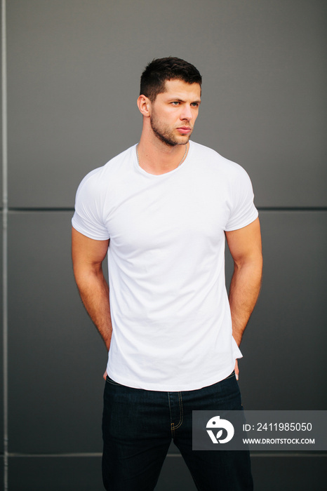 Man wearing white blank t-shirt with space for your logo