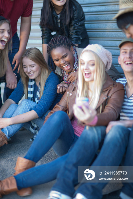 Group of teenagers fooling about