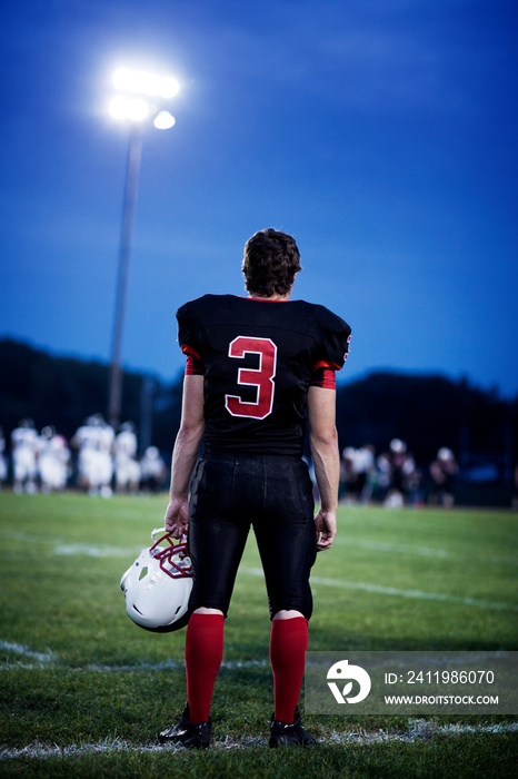 Rear view of American football player (14-15)