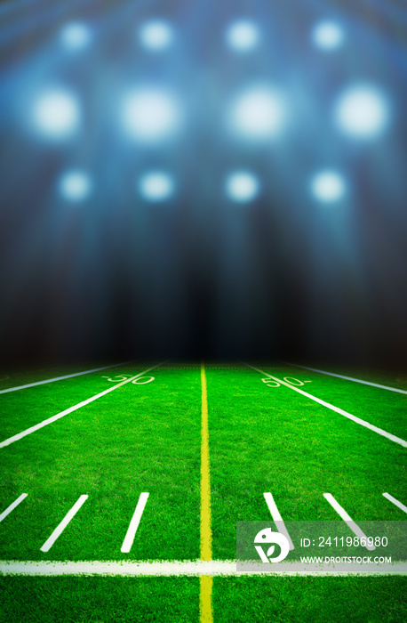 Illuminated football field at night