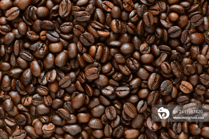 Full frame of aromatic roasted coffee beans background