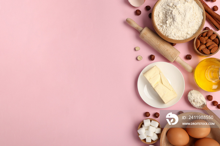 Ingredients for pie or cake cooking on pink background