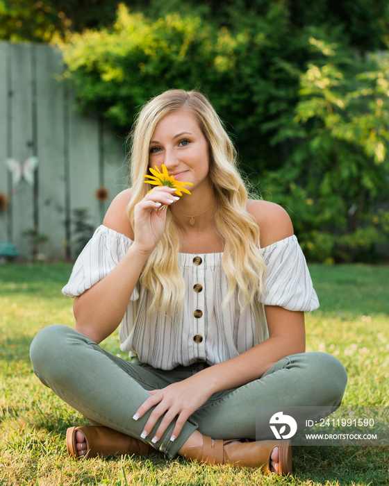 High School Senior Photo of Blonde Caucasian Girl Outdoors