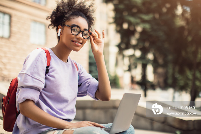 African American Student Girl Posing With Laptop Wearing Eyeglasses Outside