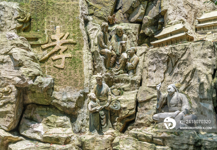 Cliff stone carvings on the half-mountain side of Emei Mountain, Sichuan Province, China