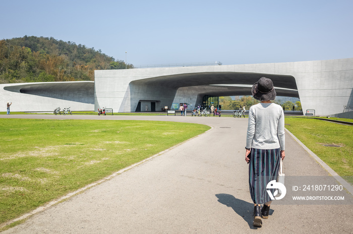 traveling woman walk at Xiangshan Visitor Center