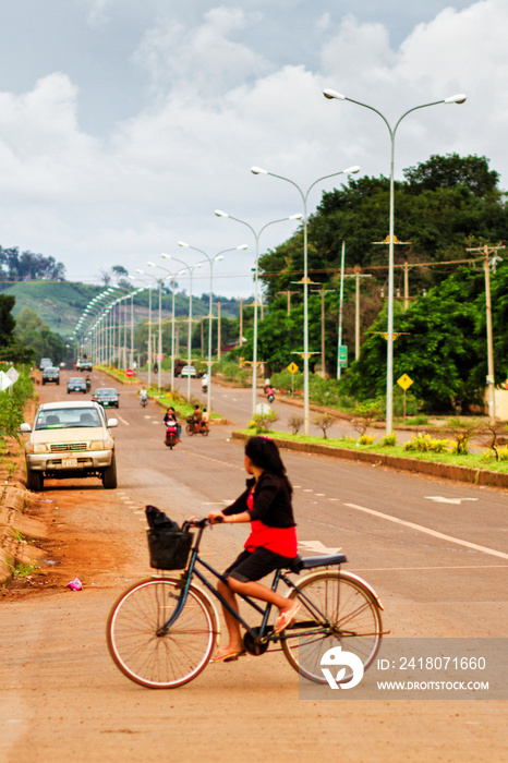 RATANAKIRI, CAMBODIA - SEP 20: View of a street in Ratanakiri, Cambodia on Sep 20, 2011. Bicycles ar