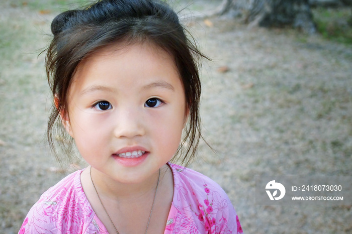 Portrait of a smiling little girl