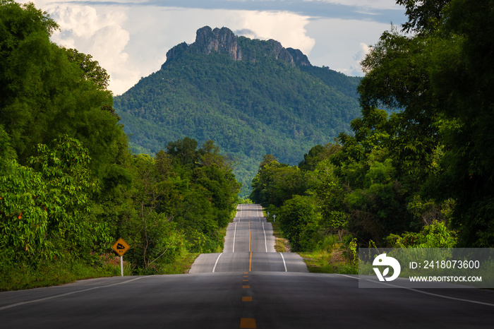 Bumpy asphalt road on hill in Lampang Thailand