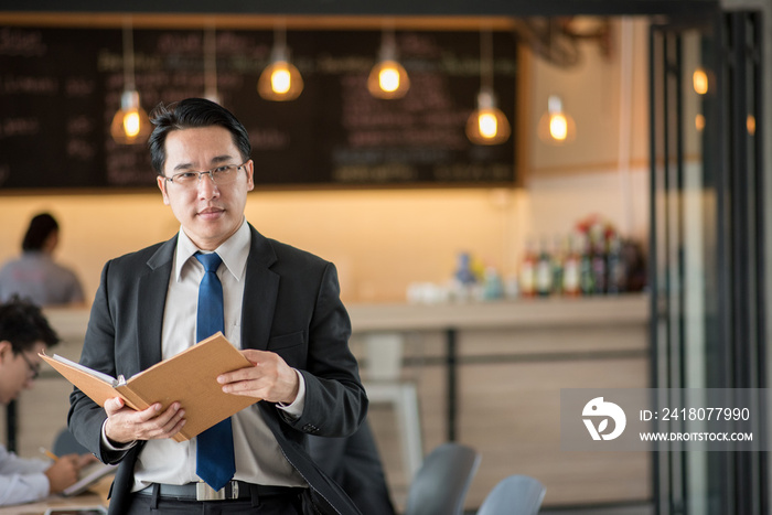 Portrait of happy asian  businessman.