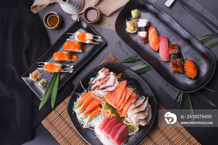 Sashimi and sushi Japanese food set. Salmon, Ikura, wasabi, fish, shrimp and tuna.