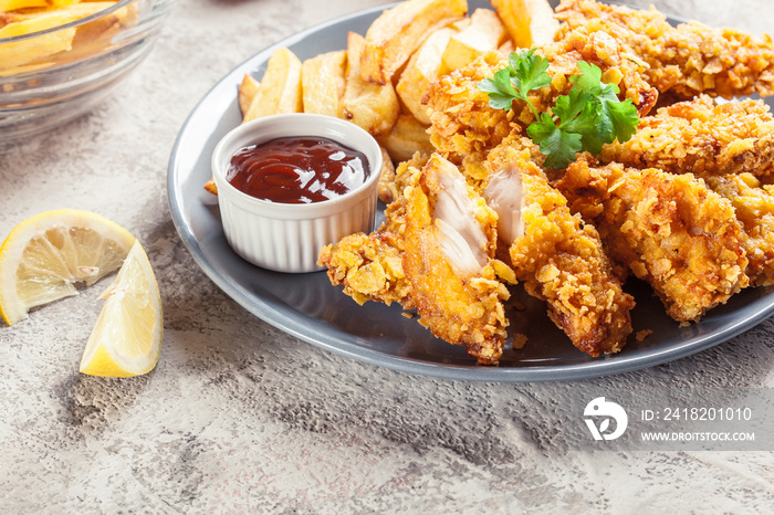 Chicken strips in cornflakes breadcrumb