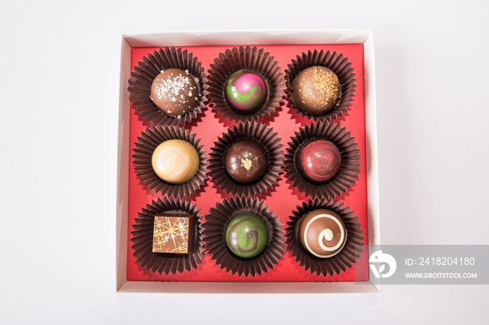 candies in a box isolated on white.