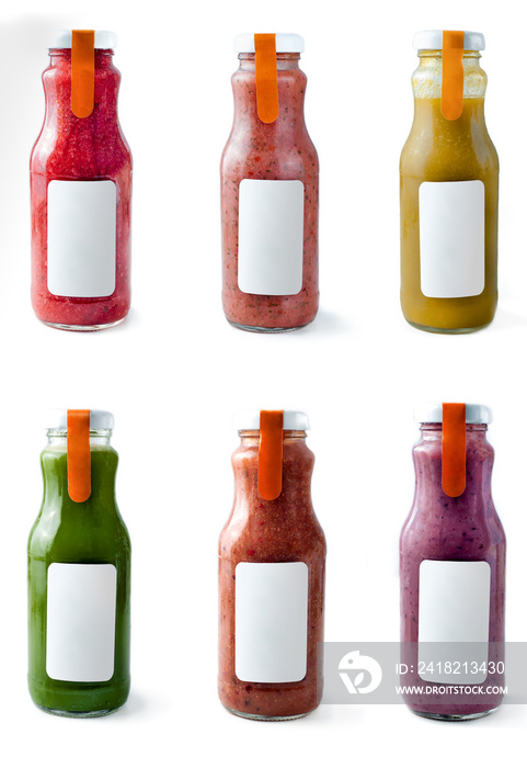Set with color smothies in glass bottles with copy space on white background, mock-up