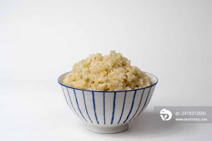 Cooked brown rice in a Japanese style bowl