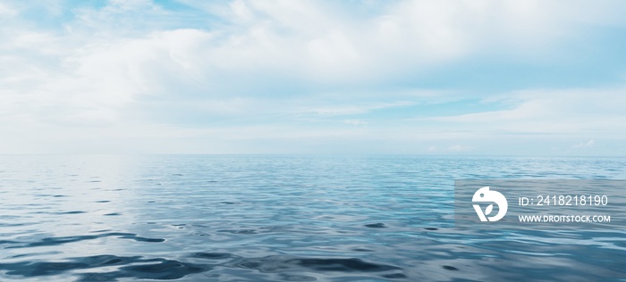 Panoramic seascape. Clear blue glowing sky, reflections, sea water surface texture. Dreamlike scener