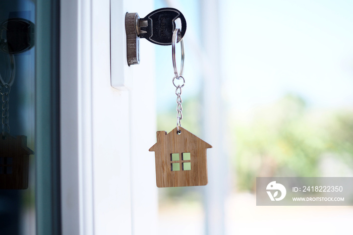Home key for unlocking the new house door. Renting, buying, selling houses