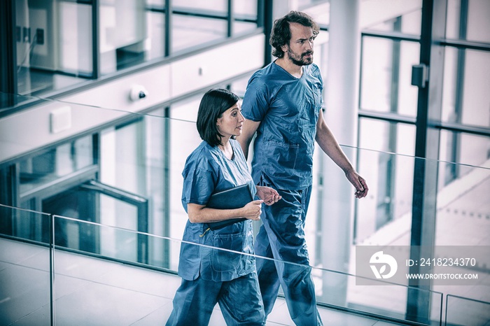 Surgeons walking in corridor