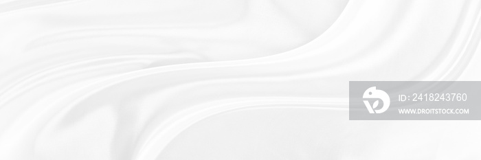 White gray satin texture that is white silver fabric silk panorama background with beautiful soft bl