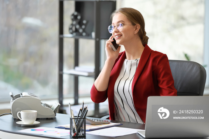 Female accountant working in office