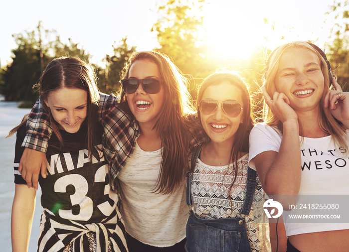 Teenage girls laughing