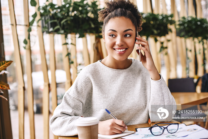 Wonder what your customer really wants? Ask. Don’t tell. Attractive business woman working at desk i