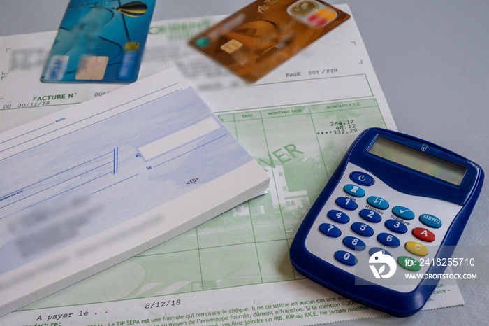 apartment bill, bank card, checkbook and calculator isolated