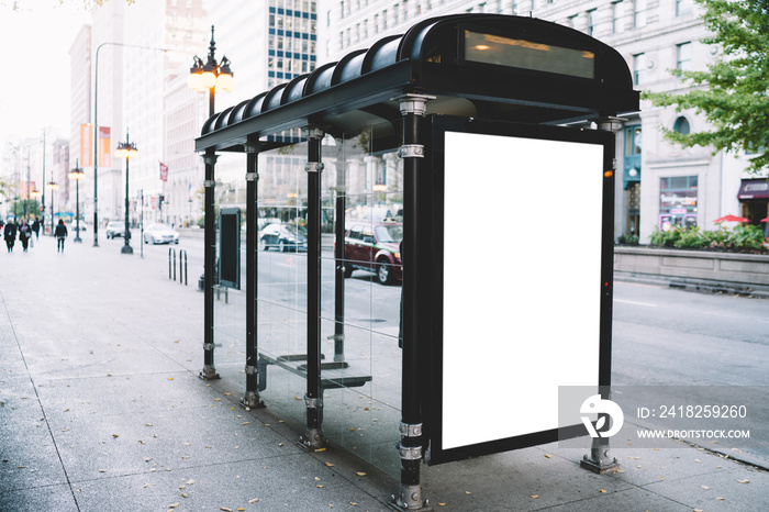 Blank billboard on modern bus station