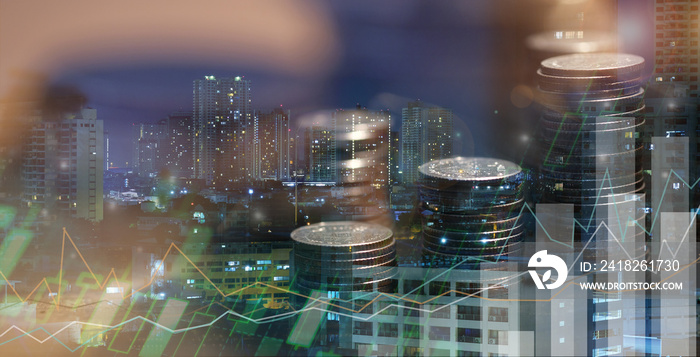 Financial investment concept, Double exposure of city night and stack of coins for finance investor,