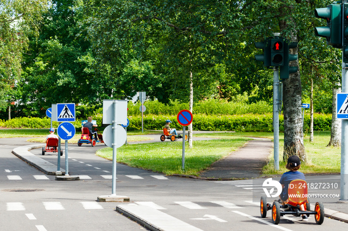 Traffic educational experience - practice park for children. Mini car road, traffic sign and traffic