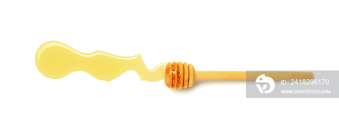 Wooden honey dipper on white background