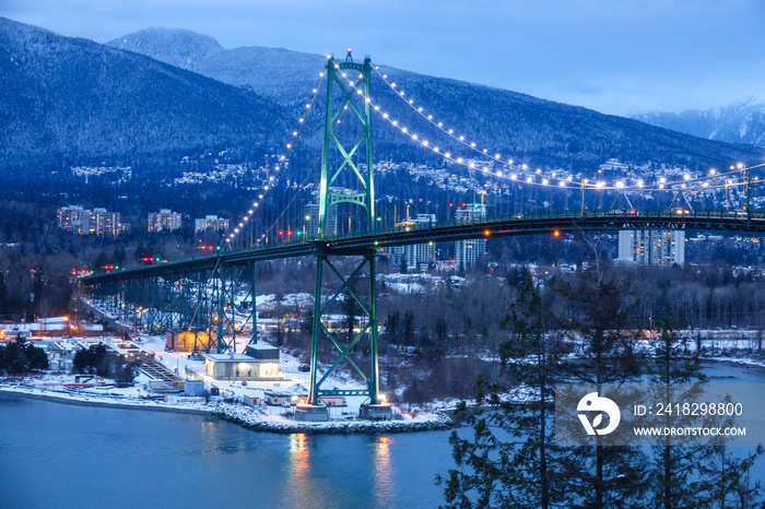 View of Lions Gate suspension Bridge in Vancouver, British Columbia, Canada at night in winter full 