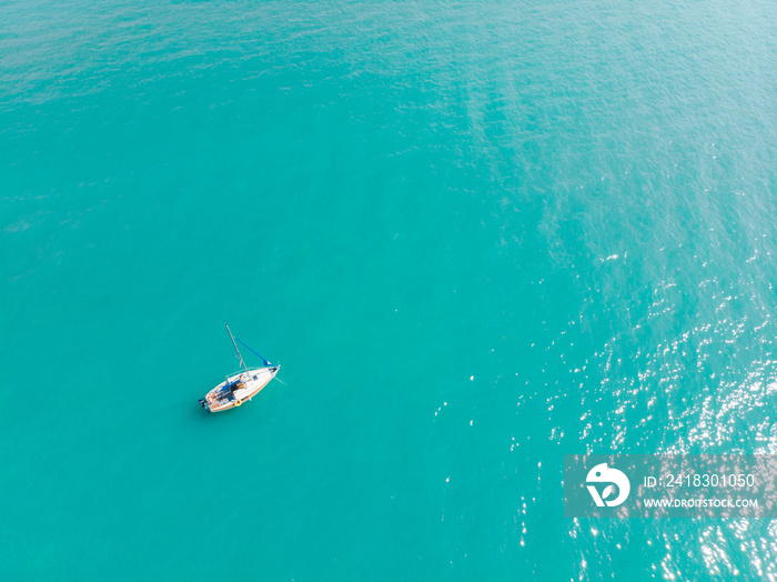 aerial view of boat in blue water